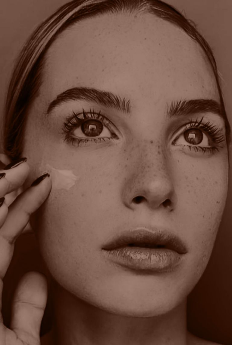 Modern living room with brown furniture and decor.